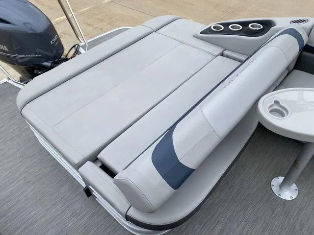 Slide: The Image of 2022 Bennington 22 SSBX boat with comfortable seating and cup holders. - 9