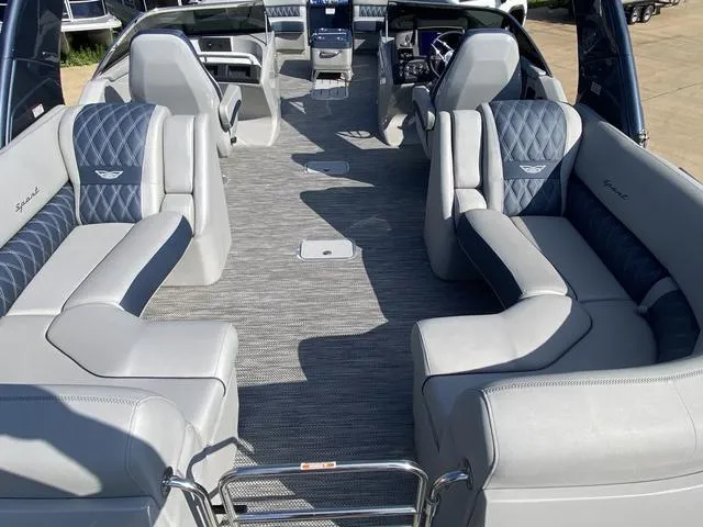 Slide: The Image of 2023 Bennington 30 QXSBWA X2 boat interior with luxurious seating and modern design. - 16