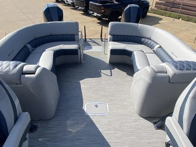 Slide: The Image of 2023 Bennington 30 QXSBWA X2 pontoon boat with luxurious seating and spacious deck. - 17