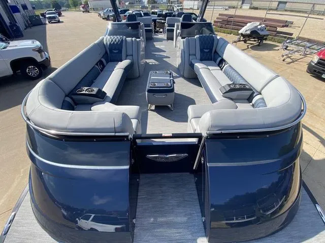 Slide: The Image of 2023 Bennington 30 QXSBWA X2 pontoon boat with luxurious seating and modern design. - 4