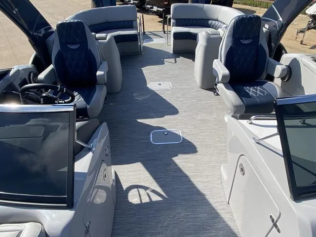 Slide: The Image of 2023 Bennington 30 QXSBWA X2 boat interior with luxurious seating and modern design. - 6