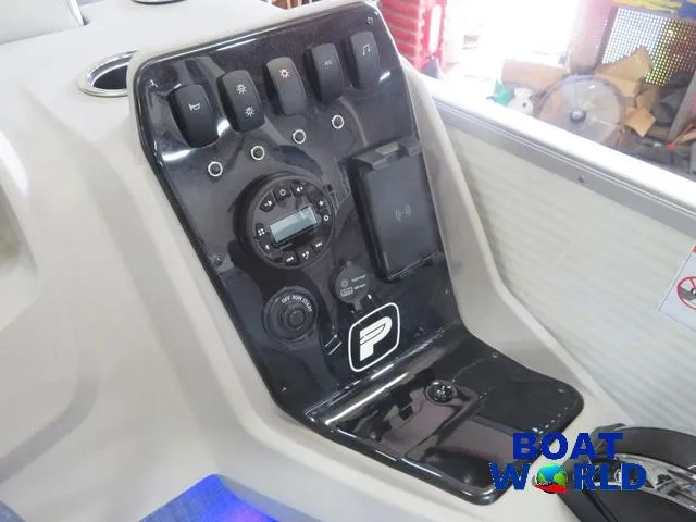 Slide: The Image of 2025 Princecraft Vectra 21 Cruise Lounge Pontoon dashboard with control panel and switches. - 13