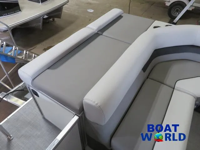 Slide: The Image of 2025 Princecraft Vectra 21 Cruise Lounge Pontoon interior with gray seating, Boat World logo. - 17