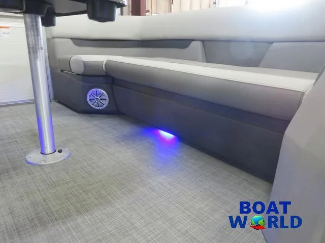Slide: The Image of 2025 Princecraft Vectra 21 Cruise Lounge Pontoon interior with ambient lighting and modern seating. - 23