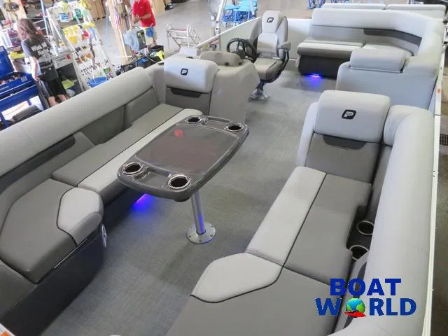 Slide: The Image of 2025 Princecraft Vectra 21 Cruise Lounge Pontoon interior with modern seating and table. - 24