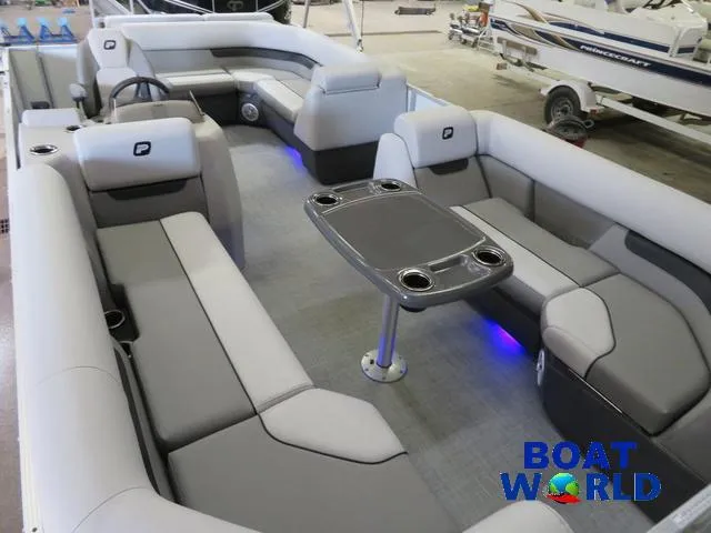 Slide: The Image of 2025 Princecraft Vectra 21 Cruise Lounge Pontoon with modern seating and table setup. - 25