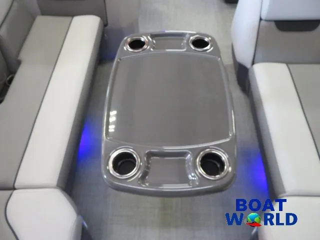 Slide: The Image of 2025 Princecraft Vectra 21 Cruise Lounge Pontoon interior with sleek table and cup holders. - 26