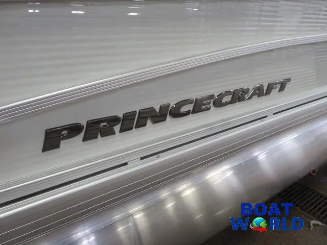 Slide: The Image of 2025 Princecraft Vectra 21 Cruise Lounge Pontoon, close-up of logo, Boat World branding. - 28