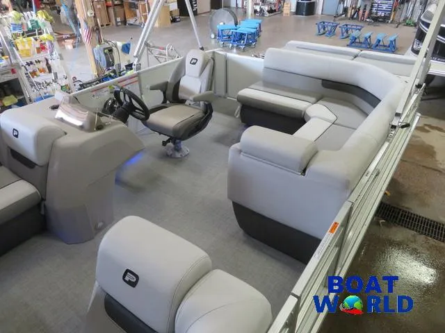 Slide: The Image of 2025 Princecraft Vectra 21 Cruise Lounge Pontoon interior with plush seating and steering console. - 4