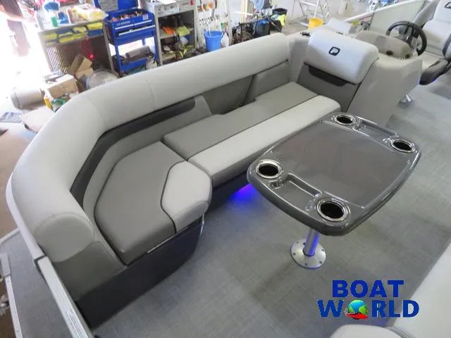Slide: The Image of 2025 Princecraft Vectra 21 Cruise Lounge Pontoon interior with plush seating and table. - 7