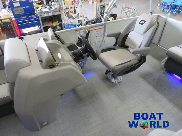 Slide: The Image of 2025 Princecraft Vectra 21 Cruise Lounge Pontoon interior with steering console and captain's chair. - 9