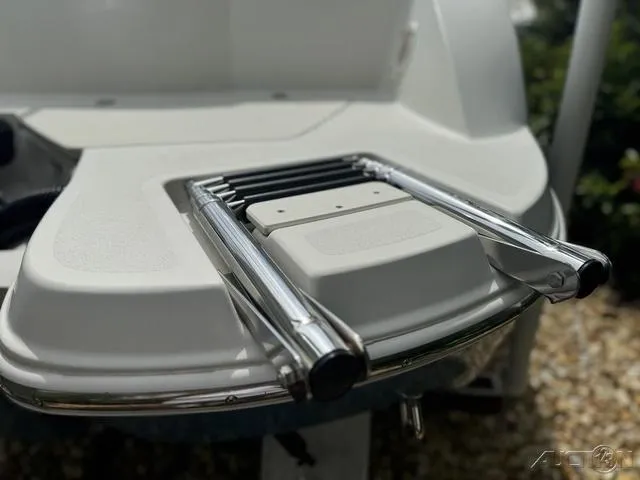 Slide: The Image of 2021 Stingray 201DS boat swim platform with stainless steel ladder. - 7