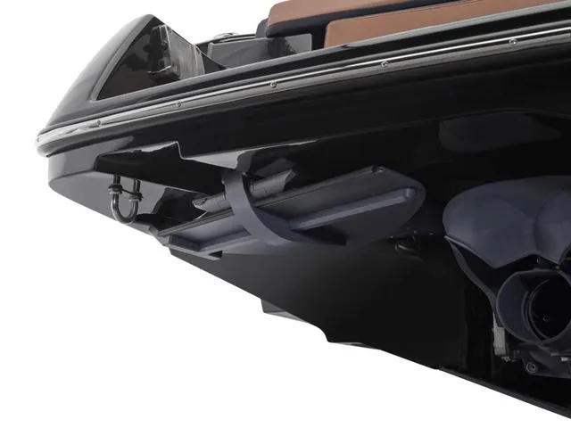 Slide: The Image of 2025 Yamaha Boats 255XD, sleek black hull detail, modern design. - 13