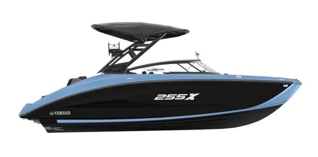 Slide: The Image of 2025 Yamaha Boats 255XD, sleek black and blue design, side view. - 21