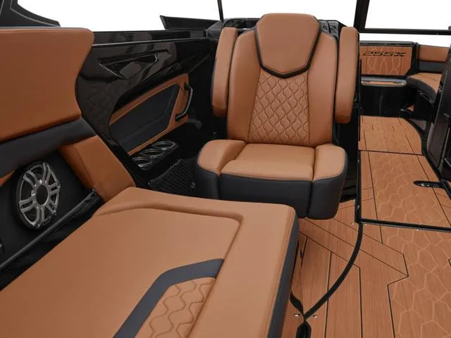 Slide: The Image of Luxurious interior of 2025 Yamaha Boats 255XD with tan leather seating and sleek design. - 4