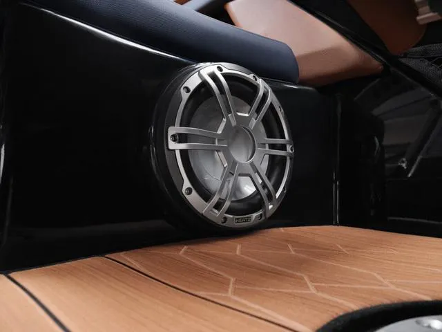 Slide: The Image of Yamaha Boats 2025 255XD interior speaker on sleek wooden deck. - 7