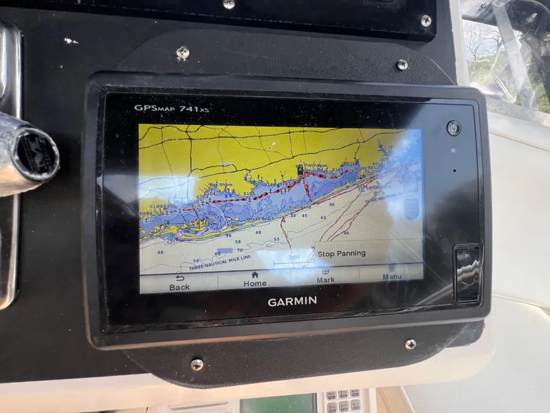 Slide: The Image of Garmin GPSMAP 741xs on 1990 Bertram 28 Flybridge displaying nautical chart. - 20