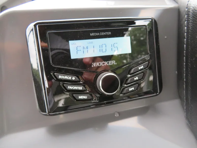 Slide: The Image of Kicker media center in 2025 Bennington 20SVL-SPS displaying FM 101.5. - 20