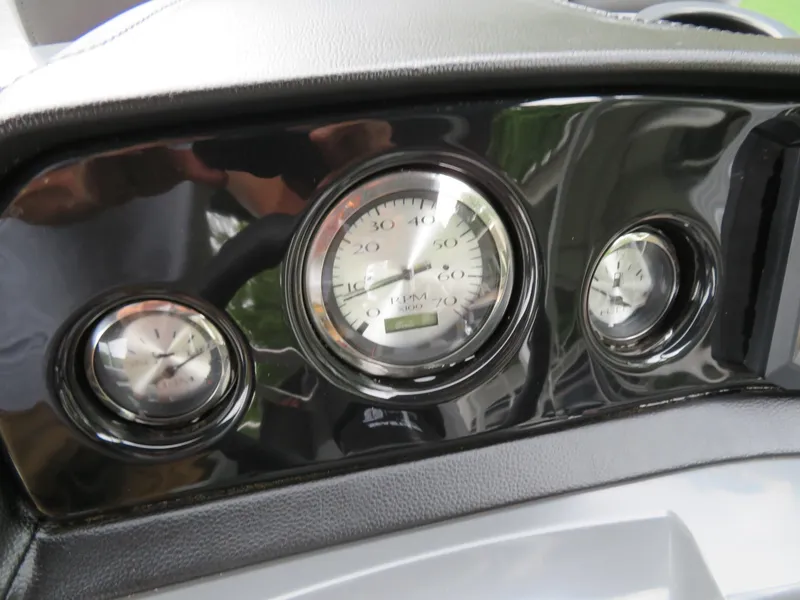 Slide: The Image of Dashboard gauges of 2025 Bennington 20SVL-SPS boat, featuring speedometer and tachometer. - 21