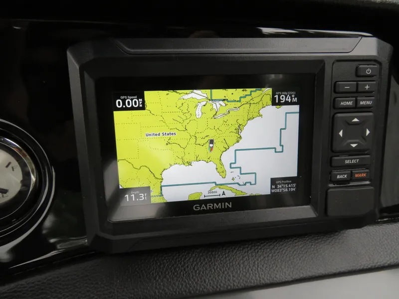 Slide: The Image of Garmin GPS display on 2025 Bennington 20SVL-SPS, showing U.S. map and navigation details. - 22