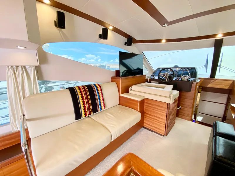 Slide: The Image of Luxurious interior of 2014 Dyna 52 yacht with modern helm and seating area. - 31