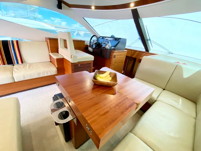 Slide: The Image of Luxurious interior of 2014 Dyna 52 yacht with plush seating and wooden accents. - 37