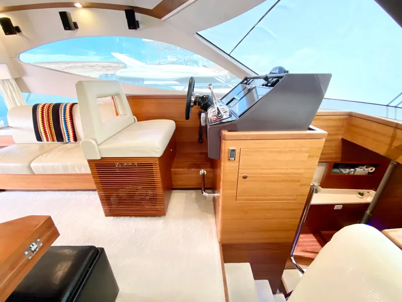 Slide: The Image of Luxurious interior of 2014 Dyna 52 yacht with modern helm and seating. - 40