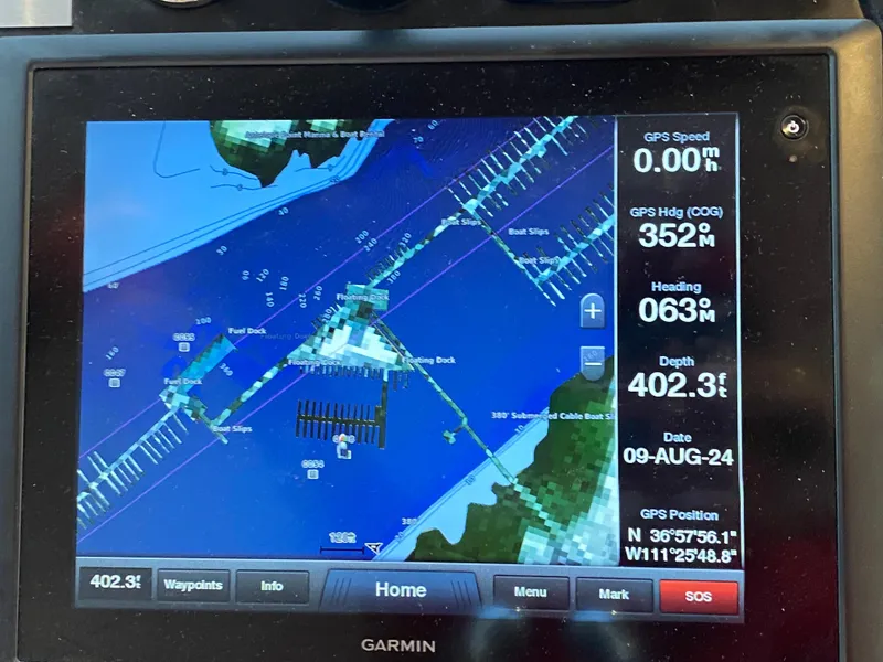 Slide: The Image of Garmin GPS display showing nautical map, speed, heading, and depth information. - 43