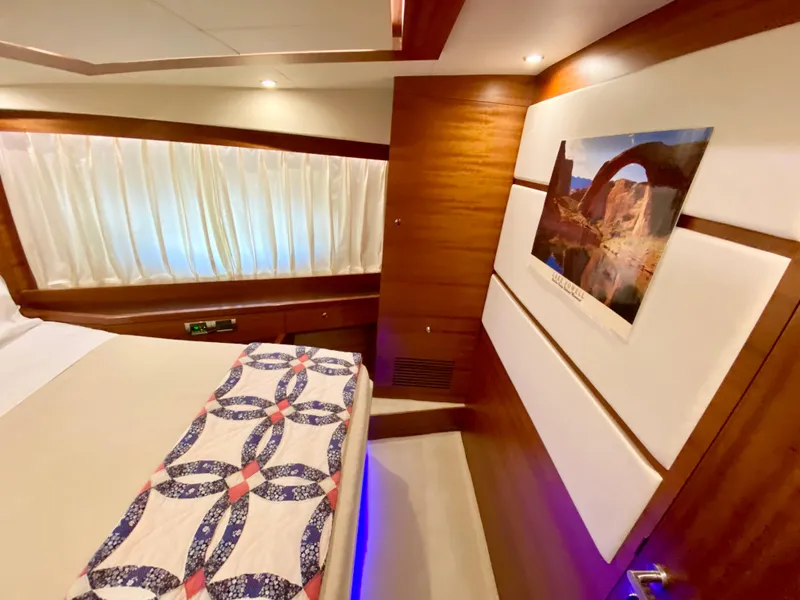 Slide: The Image of Luxurious cabin interior of 2014 Dyna 52 yacht with elegant decor and artwork. - 49