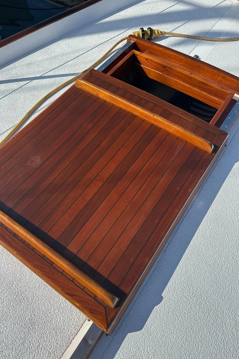 Slide: The Image of 1969 Calkins 50 Pilot House yacht deck with anchor chain and winch. - 10