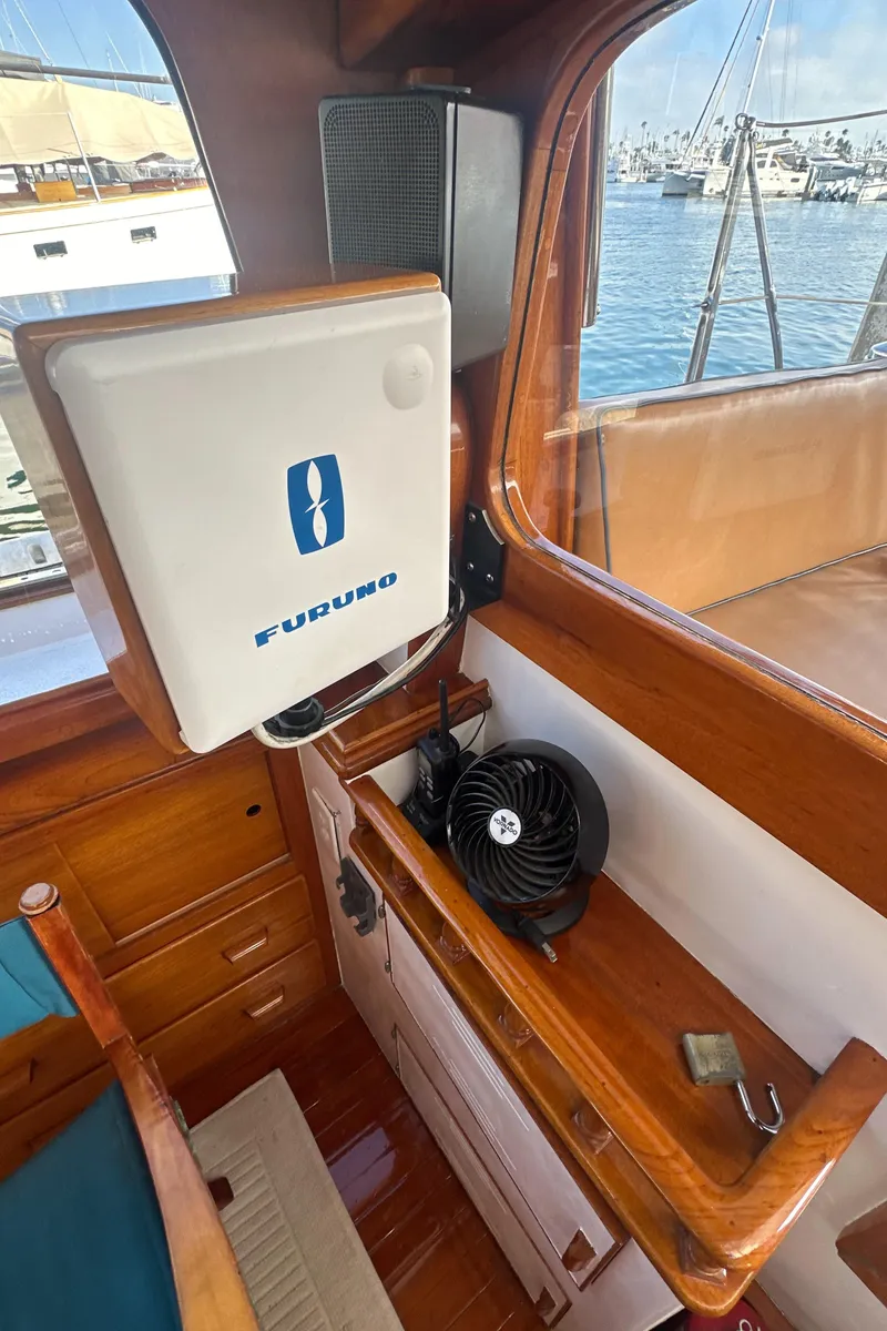 Slide: The Image of Interior of 1969 Calkins 50 Pilot House with Furuno equipment and fan. - 18