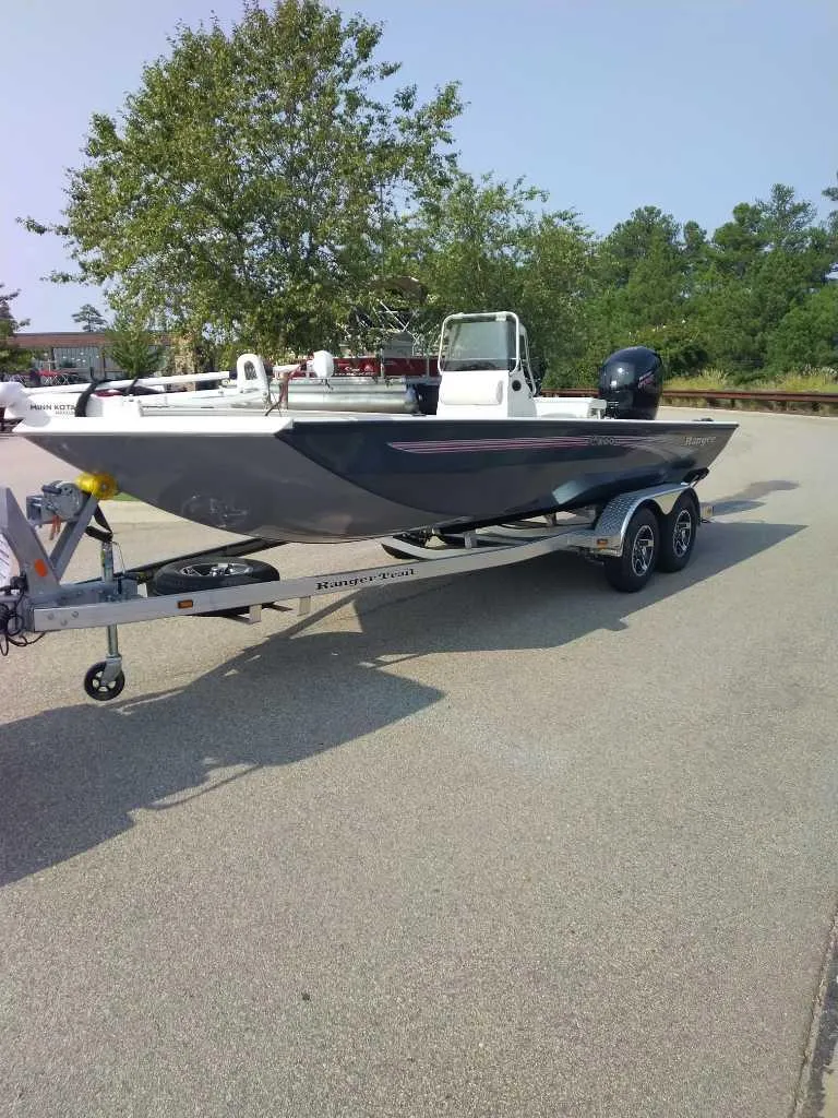 The Image of 2024 Ranger RB200 boat on trailer, parked outdoors. - 0