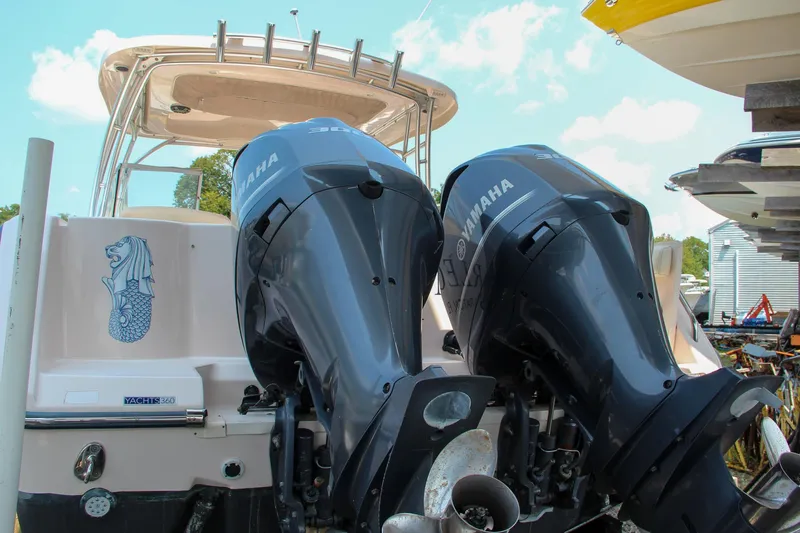 Slide: The Image of 2014 Grady-White Freedom 307 boat with dual Yamaha outboard engines. - 3