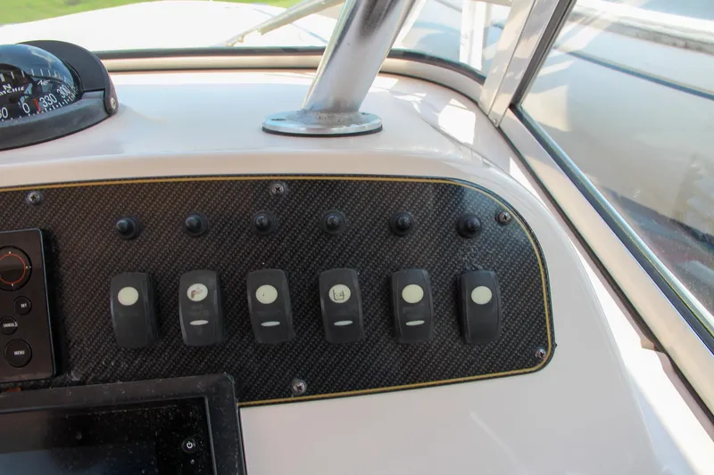 Slide: The Image of Dashboard controls of 2014 Grady-White Freedom 307 boat. - 30