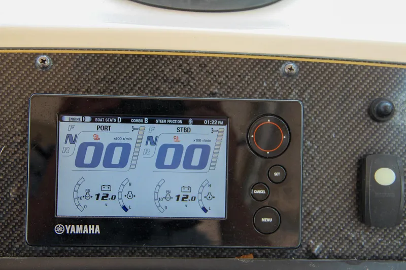 Slide: The Image of Yamaha control panel on 2014 Grady-White Freedom 307 boat dashboard. - 36
