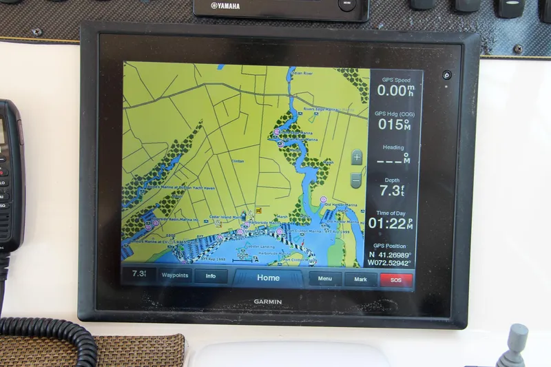 Slide: The Image of Garmin GPS display on 2014 Grady-White Freedom 307 boat dashboard. - 37