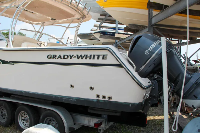 Slide: The Image of 2014 Grady-White Freedom 307 boat on trailer with Yamaha engine. - 9