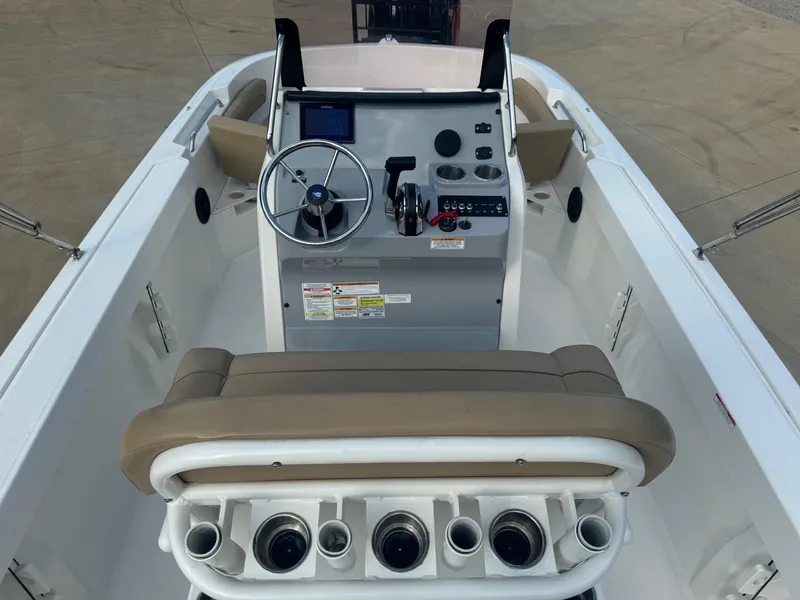Slide: The Image of 2022 Trophy T20 boat interior with steering console and seating. - 3