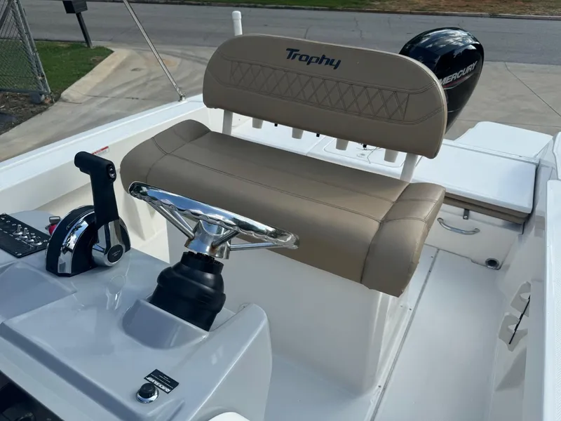 Slide: The Image of 2022 Trophy T20 boat interior with steering wheel and beige seating. - 6