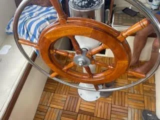Slide: The Image of Wooden steering wheel on 1978 Islander Freeport 41 Ketch sailboat. - 35