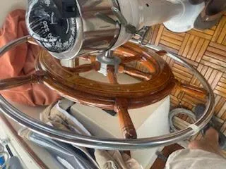 Slide: The Image of Wooden steering wheel of 1978 Islander Freeport 41 Ketch sailboat. - 36