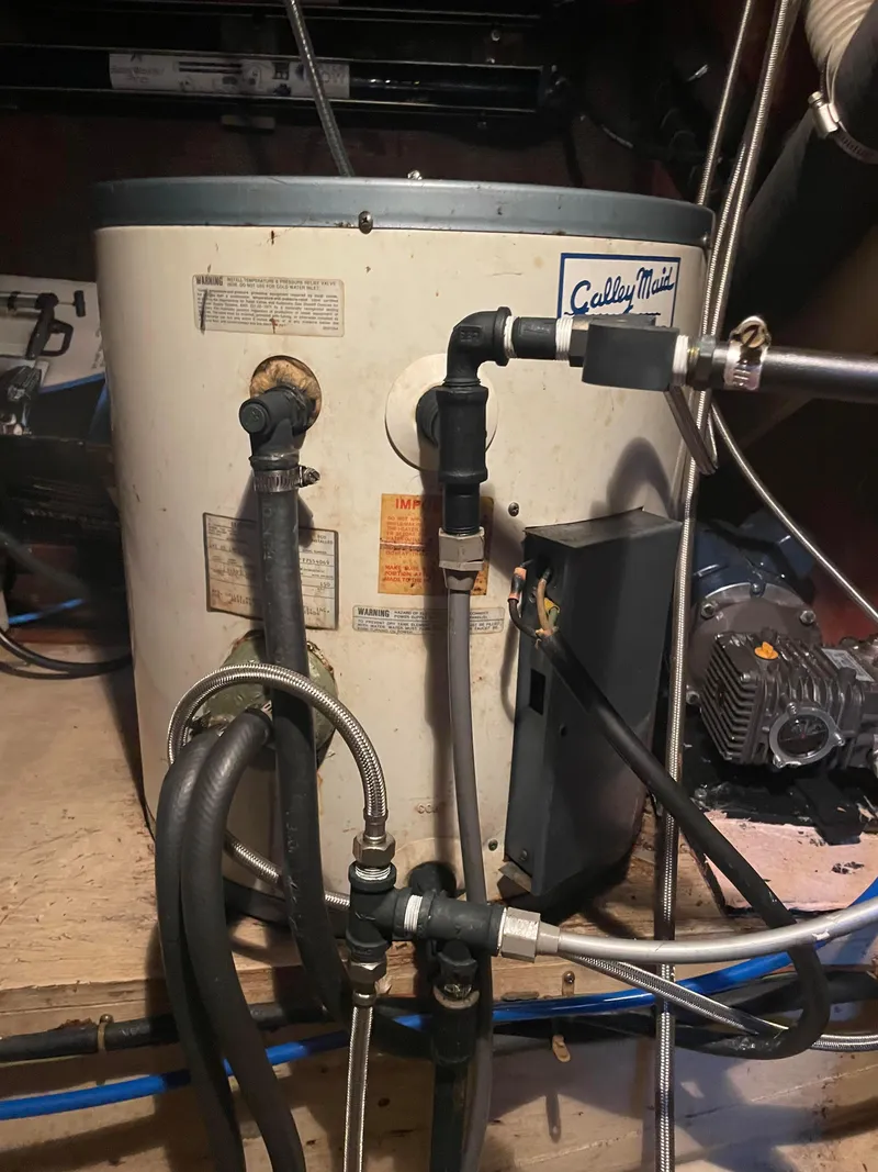 Slide: The Image of Calley Maid water heater in 1978 Islander Freeport 41 Ketch engine room. - 37