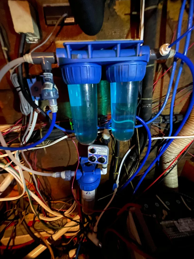 Slide: The Image of Water filtration system in 1978 Islander Freeport 41 Ketch boat engine room. - 40