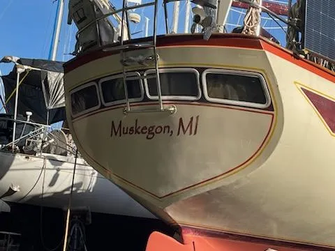 Slide: The Image of 1978 Islander Freeport 41 Ketch docked, Muskegon, MI, stern view. - 6