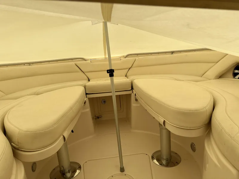Slide: The Image of 2017 Grady-White Freedom 375 boat interior with beige seating and canopy. - 18