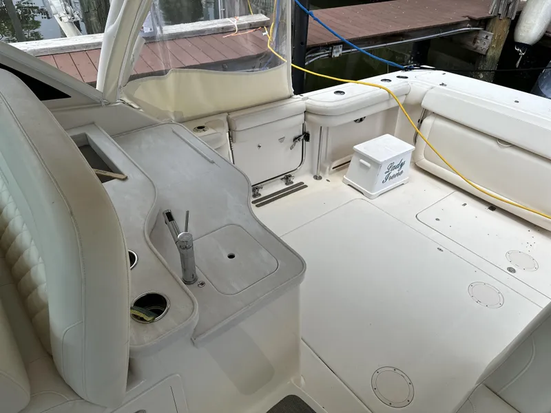 Slide: The Image of 2017 Grady-White Freedom 375 boat interior with seating and storage areas. - 22