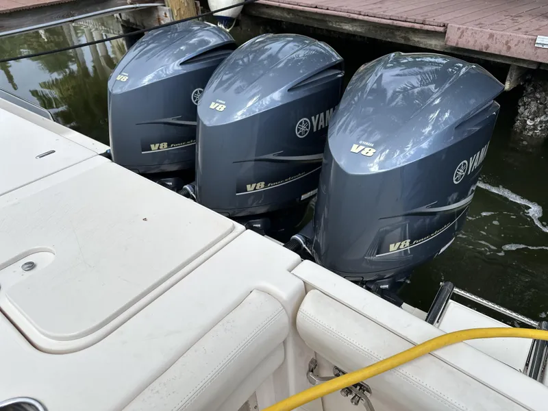 Slide: The Image of Triple Yamaha V8 outboard engines on a 2017 Grady-White Freedom 375 boat. - 29