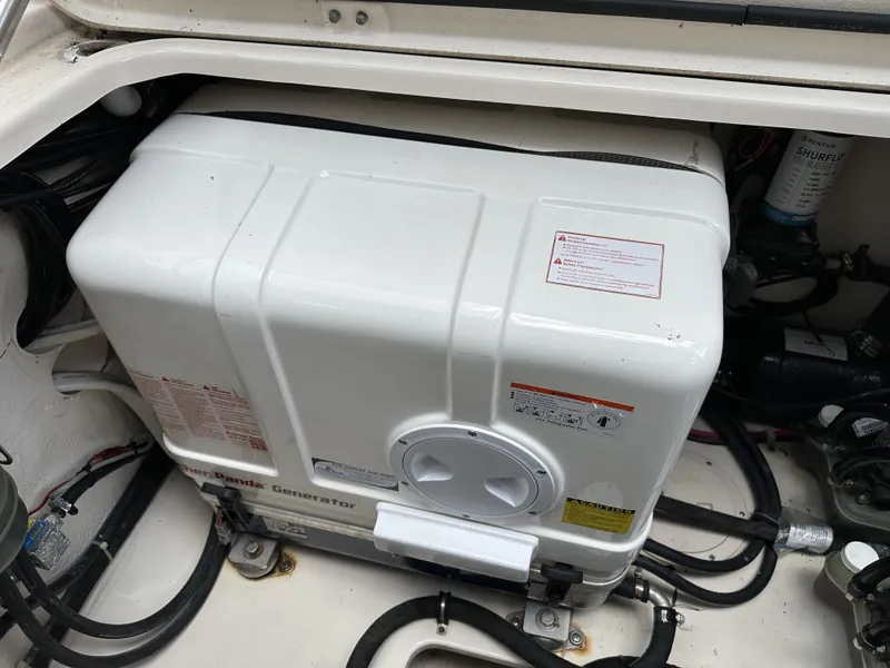 Slide: The Image of Generator in 2017 Grady-White Freedom 375 boat engine compartment. - 34