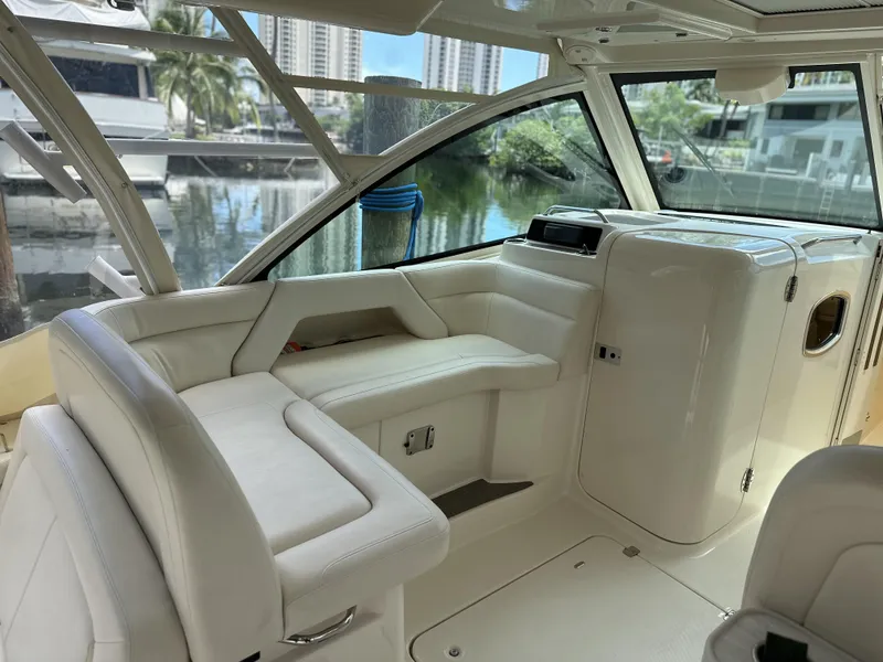 Slide: The Image of 2017 Grady-White Freedom 375 boat interior with white seating and modern design. - 40