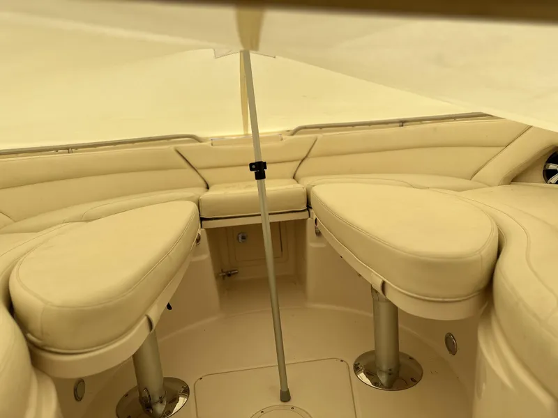 Slide: The Image of 2017 Grady-White Freedom 375 boat interior with beige seating and canopy. - 44